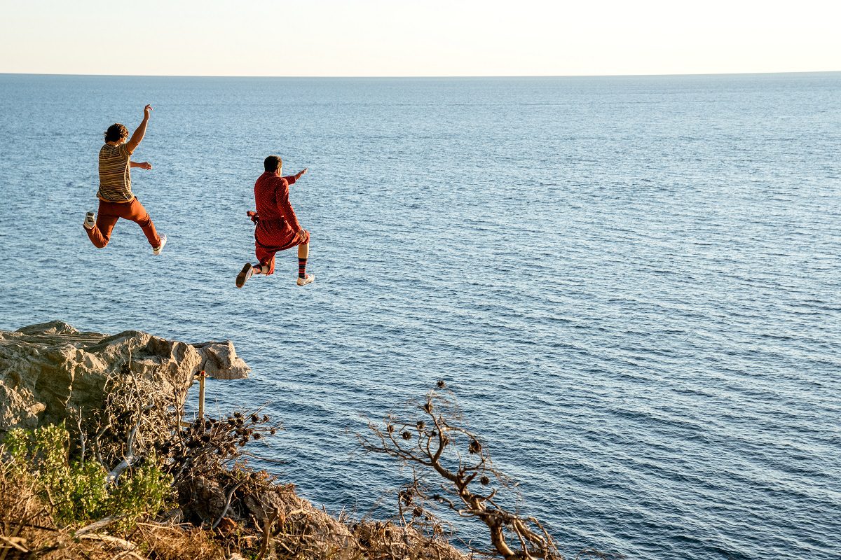 Javi and Nick Cage jump off a cliff into the sea The Unbearable Weight of Massive Talent - Silver Magazine www.silvermagazine.co.uk