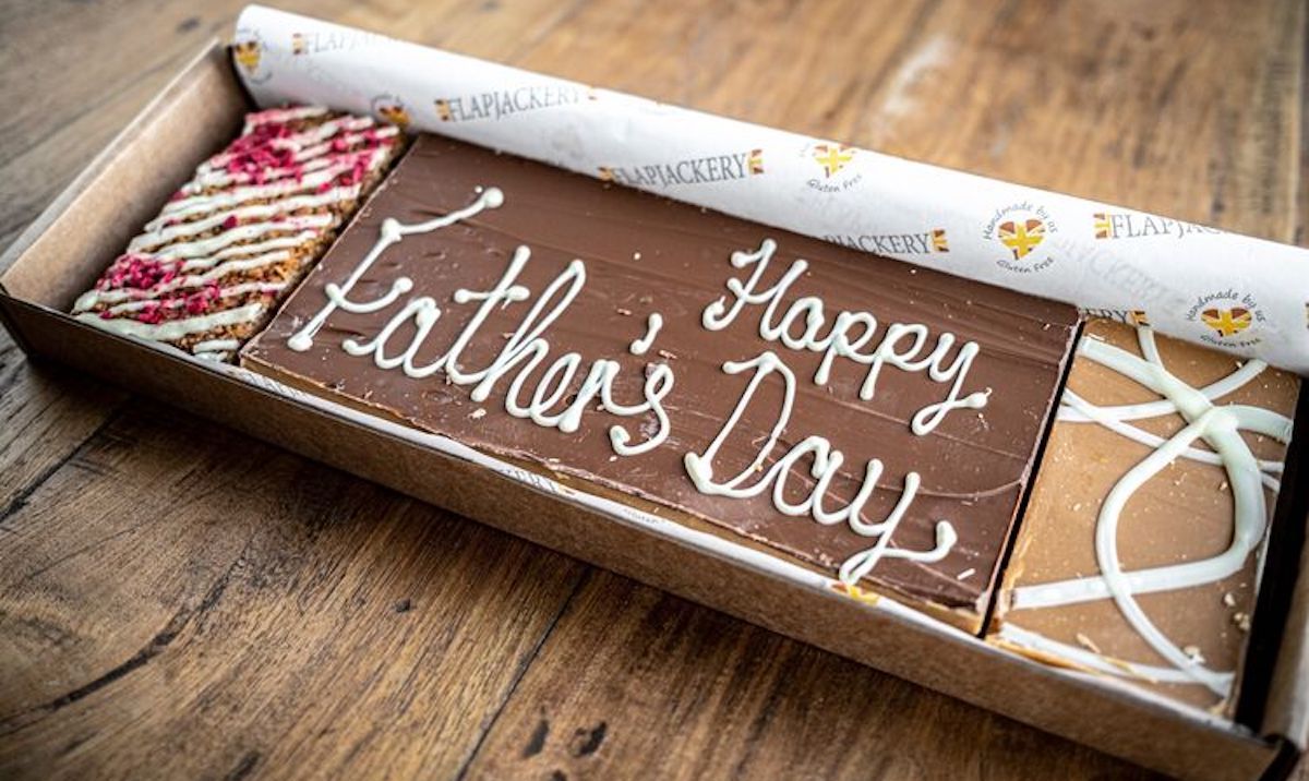 An assortments of flapjacks with 'Happy Father's Day' written in white icing