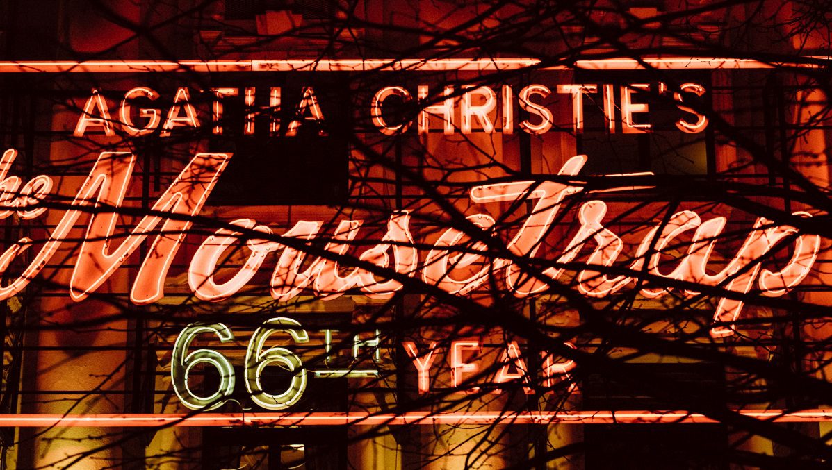 Image shows theatre sign in lights from the Mousetrap show in London
