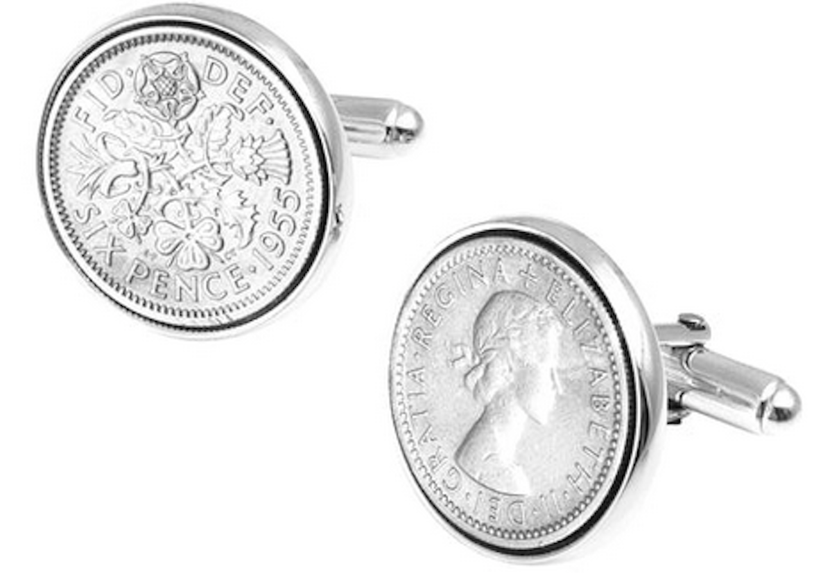 Silver cuff links with penny engraved into the circular face. Men's Christmas party wear